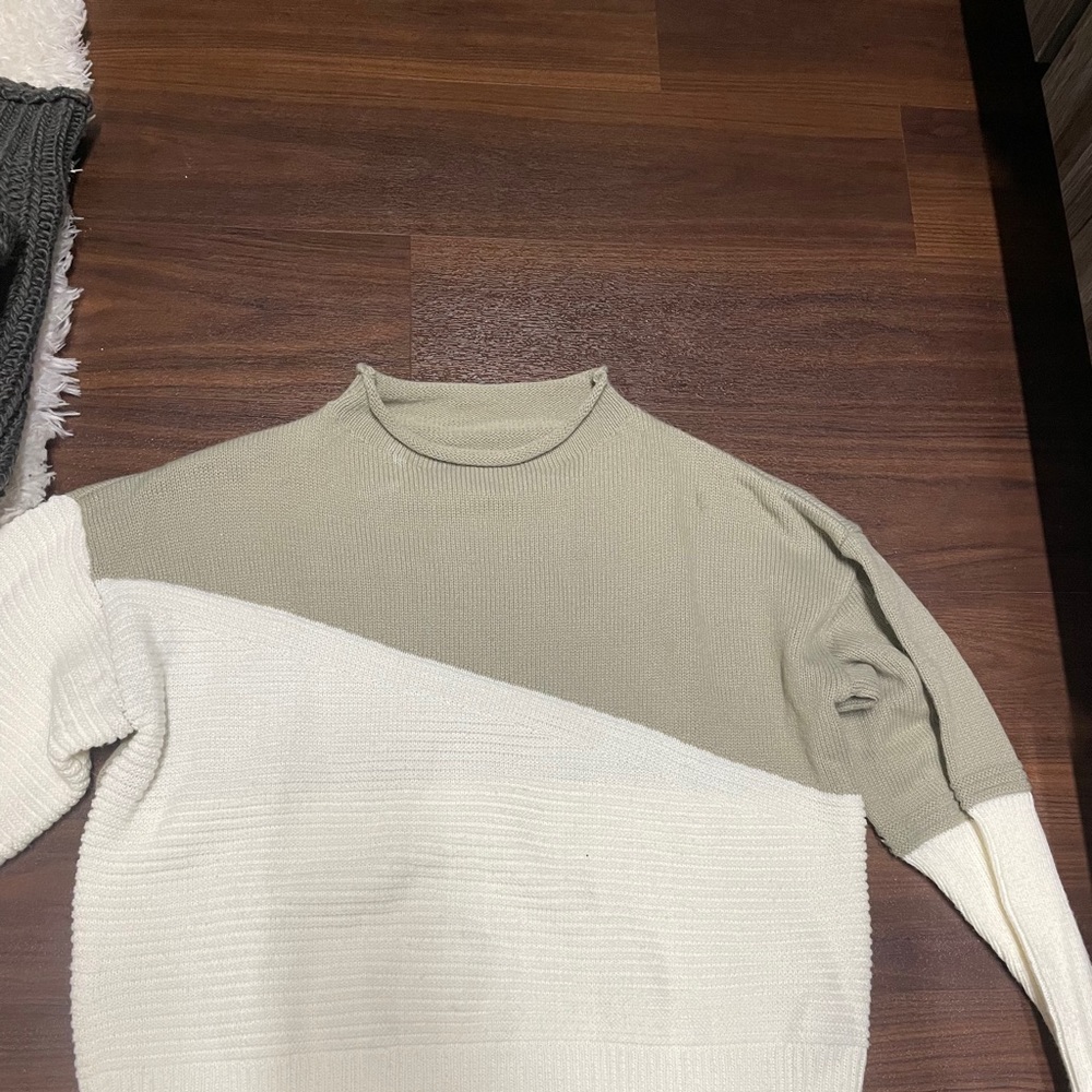 Nice green and white sweater.